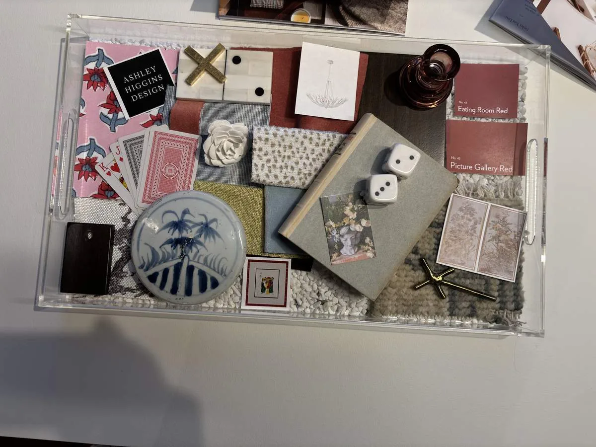 Tray with design samples: fabric swatches, paint chips, small items. All in clear view